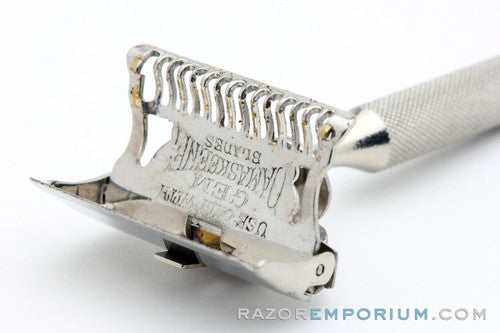1930s Gem Minute Man Metal Wall Hanger with Single Edge Razor