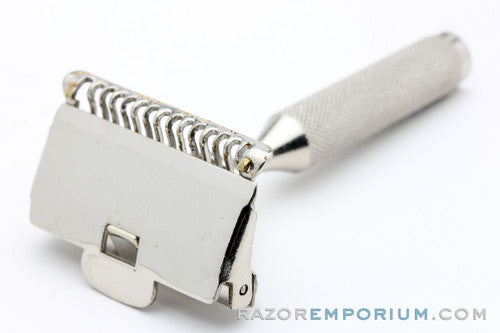 1930s Gem Minute Man Metal Wall Hanger with Single Edge Razor