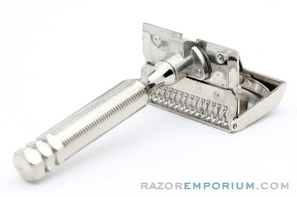 1930's Gem Minute Man Metal Wall Hanger with Single Edge Razor